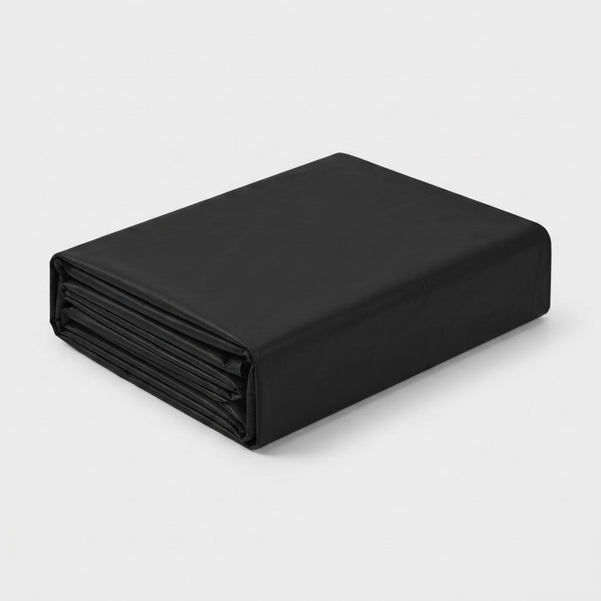 A folded black fabric item, likely a bed sheet or duvet cover, shown on a clean light gray background.