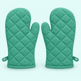 Pair of turquoise quilted cotton blend oven mitts centered on a pale turquoise background.