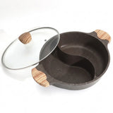A dark brown speckled divided pot with a glass lid featuring light wood handles, shown on a white background.