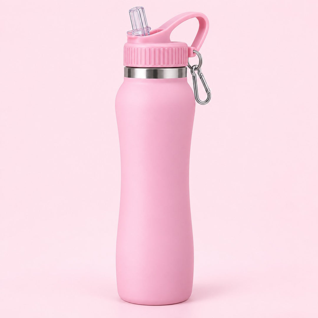 Pink insulated straw bottle centered on a pale pink studio background with its attached carabiner.