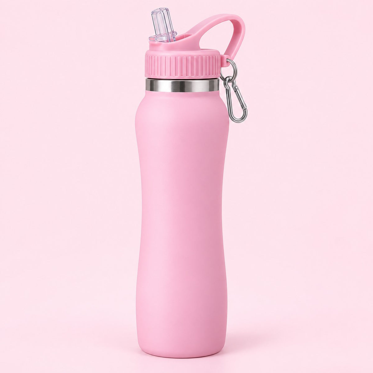 Pink insulated straw bottle centered on a pale pink studio background with its attached carabiner.