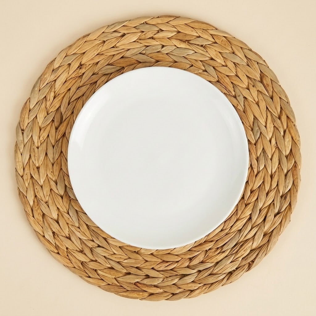 A white plate sits centrally on a round tan braided placemat, viewed from above against a cream background.