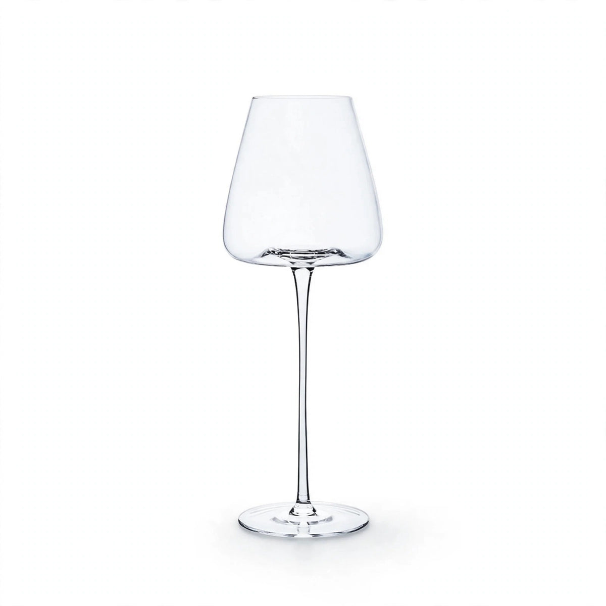 A single empty clear wine glass with a tapered bowl, slender stem, and round base stands against a white background.