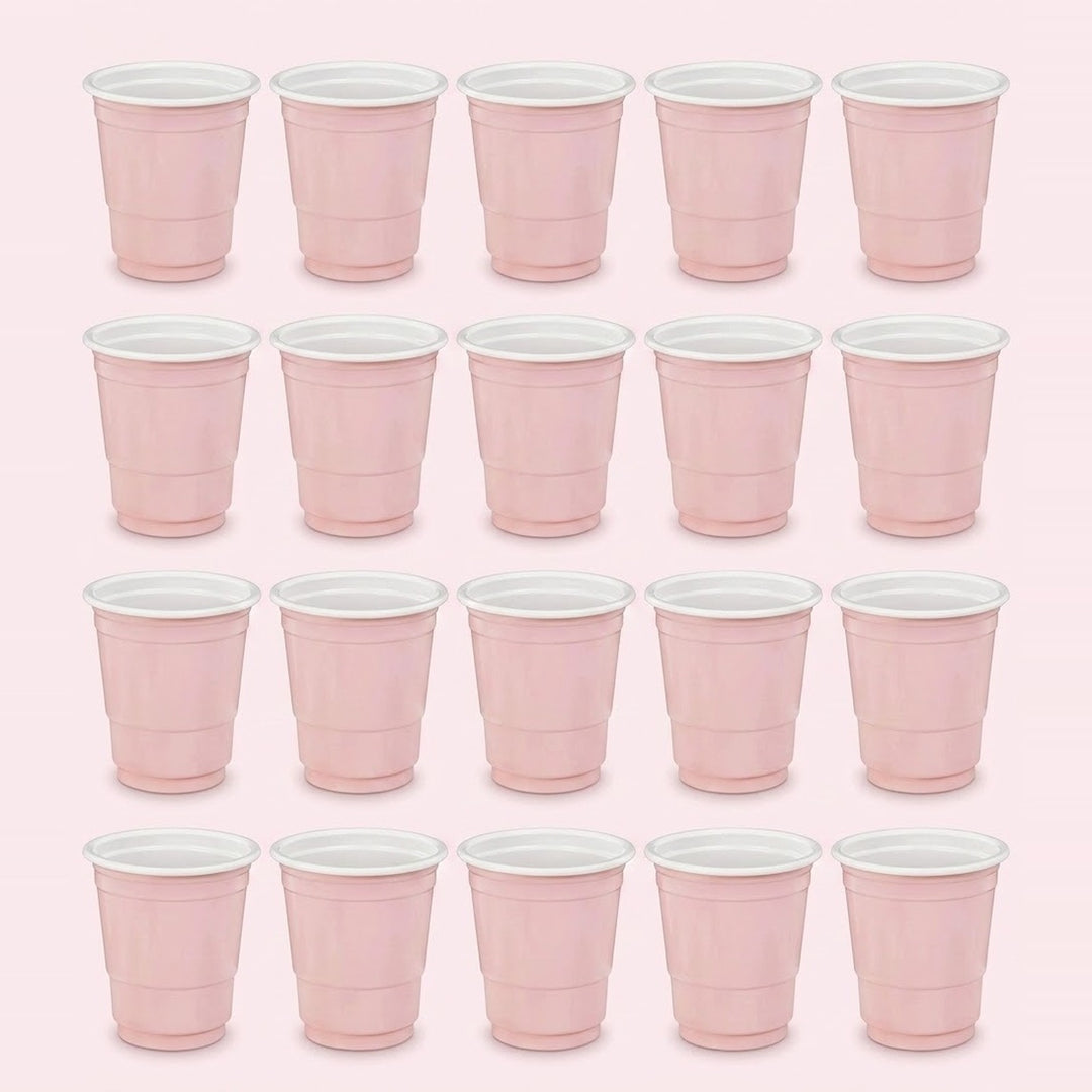 Twenty pale pink cups with white interiors are arranged in four rows of five against a light pink background.