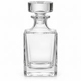One empty smooth square glass decanter with its matching broad glass stopper on white.