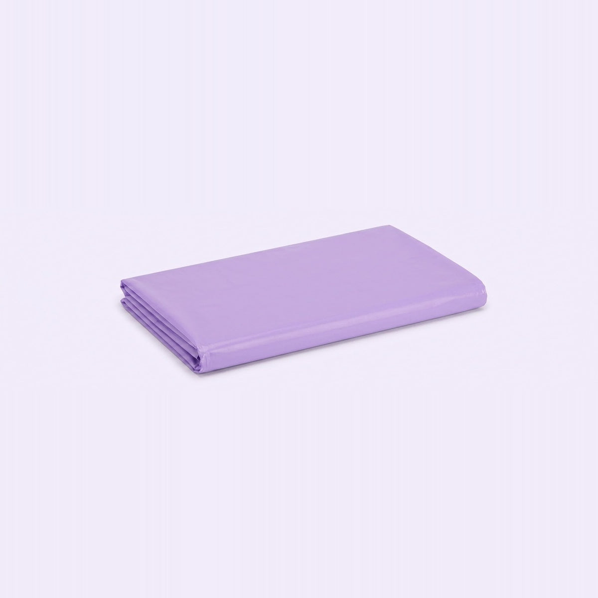 A folded sheet in a solid light purple or lavender color, displayed on a clean, light lavender-white background.