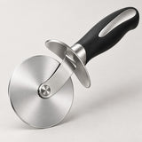 Pizza cutter wheel shown close up with its polished blade and protective finger guard.