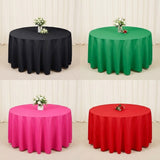 Four round tablecloths shown in a 2x2 grid: black, green, pink, and red. Each table is covered with a draped tablecloth and styled with a small floral arrangement on a light neutral floor and drape backdrop.