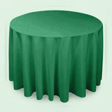 A round green tablecloth draped over a round table, shown against a plain light background.