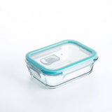 A rectangular clear glass storage container with a translucent aqua blue silicone seal and a matching clear lid, shown on a clean white background.