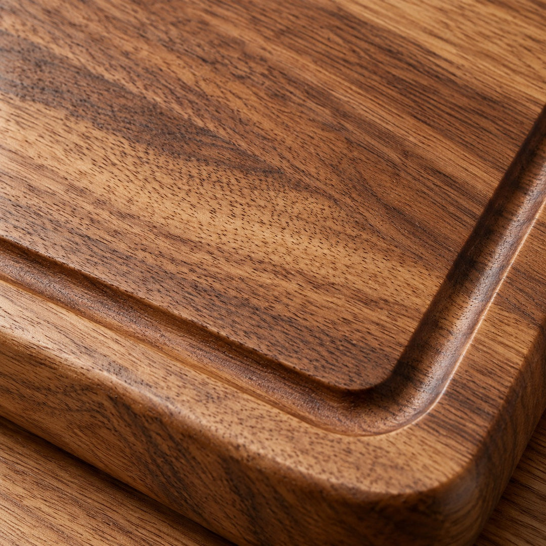 Wooden Kitchen Cutting Board macro shows the warm grain, smooth finish, and routed groove.