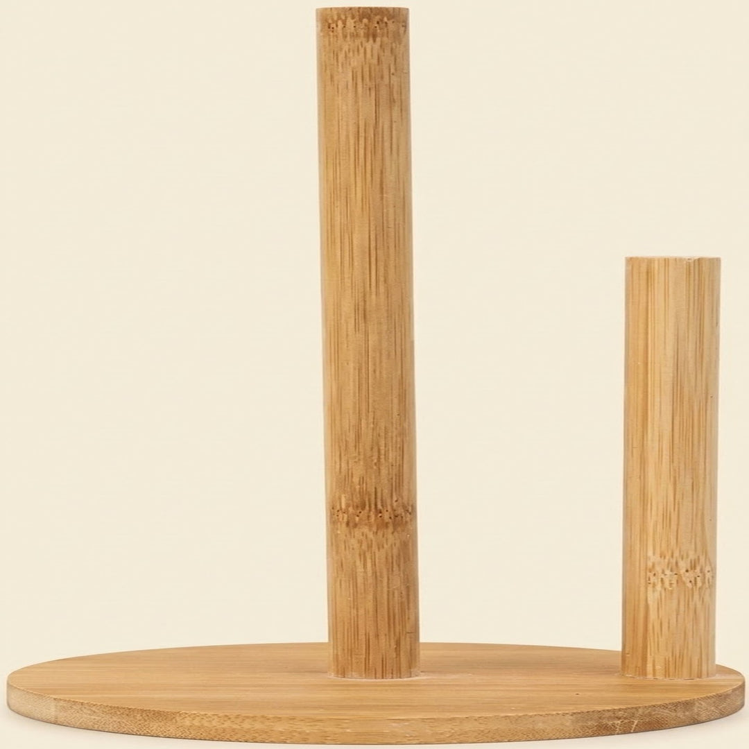 A natural bamboo tabletop organizer with a round base, featuring one tall cylindrical stand and one shorter cylindrical stand, shown against a solid light beige background.