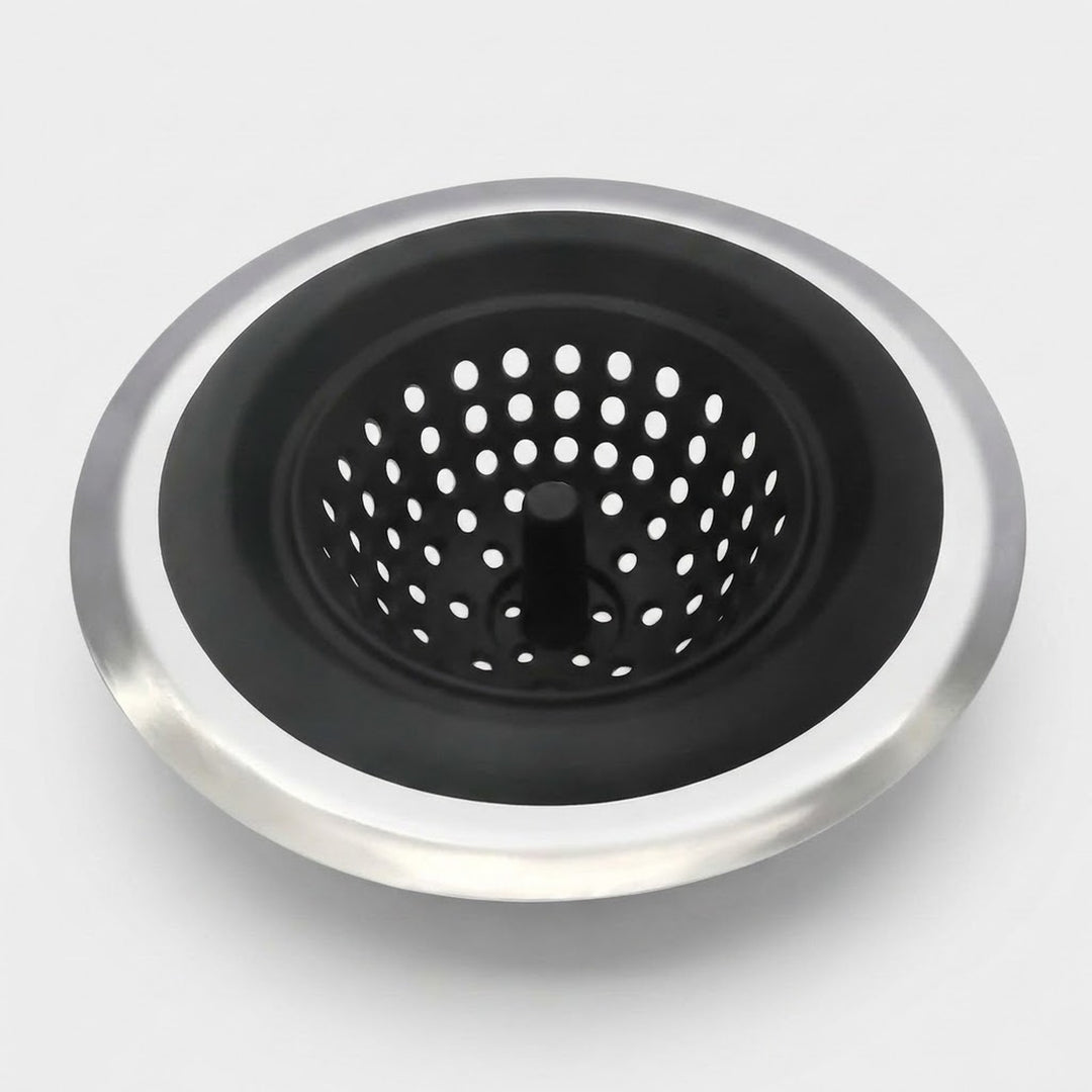 A round kitchen sink drain strainer with a brushed silver metal outer rim and a black inner mesh basket, shown on a light gray background.