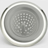 A stainless steel kitchen sink drain strainer basket with a perforated center cone, shown from a top-down view on a light gray background.