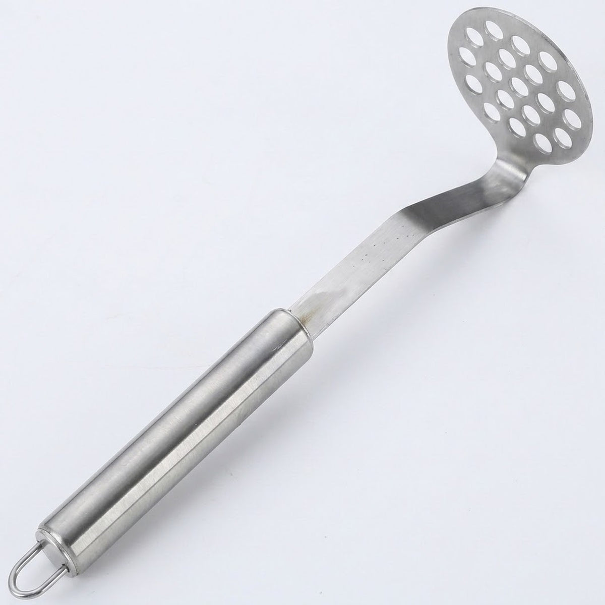 A stainless steel potato masher with a perforated oval head and a long cylindrical handle, shown diagonally on a plain white background.