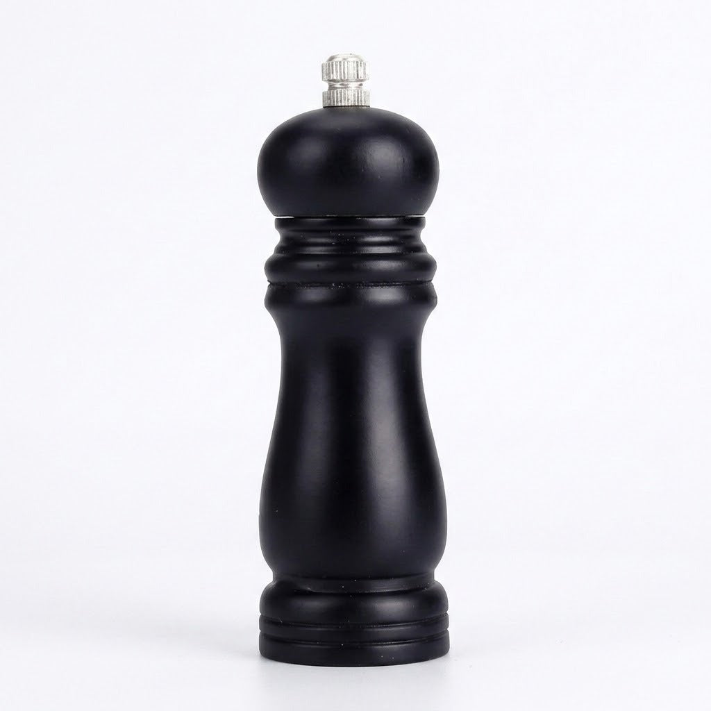 A single black pepper mill grinder with a silver metal top knob, photographed against a seamless white background.