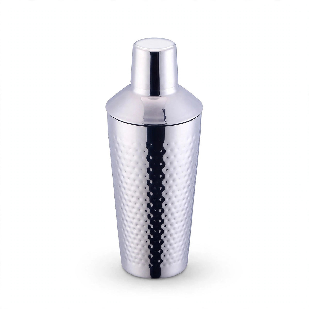 Single hammered silver stainless steel cocktail shaker with cap on a plain white background.