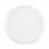 A round white plate with a delicate border of small white pearls, photographed from directly above on a clean white background.