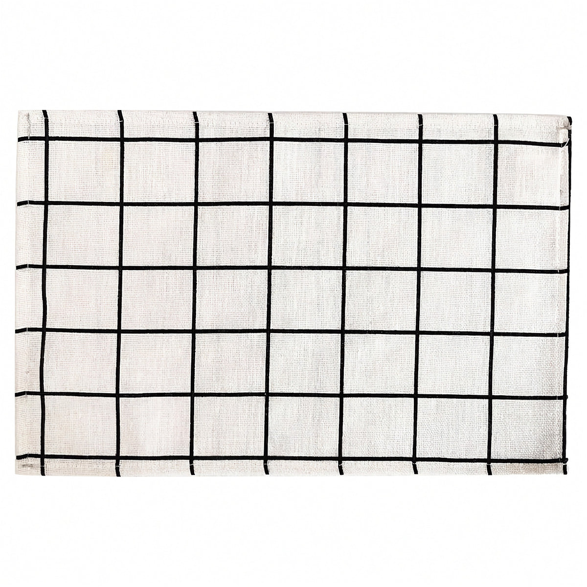 A square white fabric placemat or table runner featuring a black hand-drawn grid pattern, shown flat against a white background.