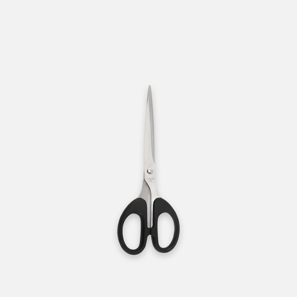 Black-handled stainless steel scissors, 6.3 in (16 cm), one pair, on a light grey backdrop