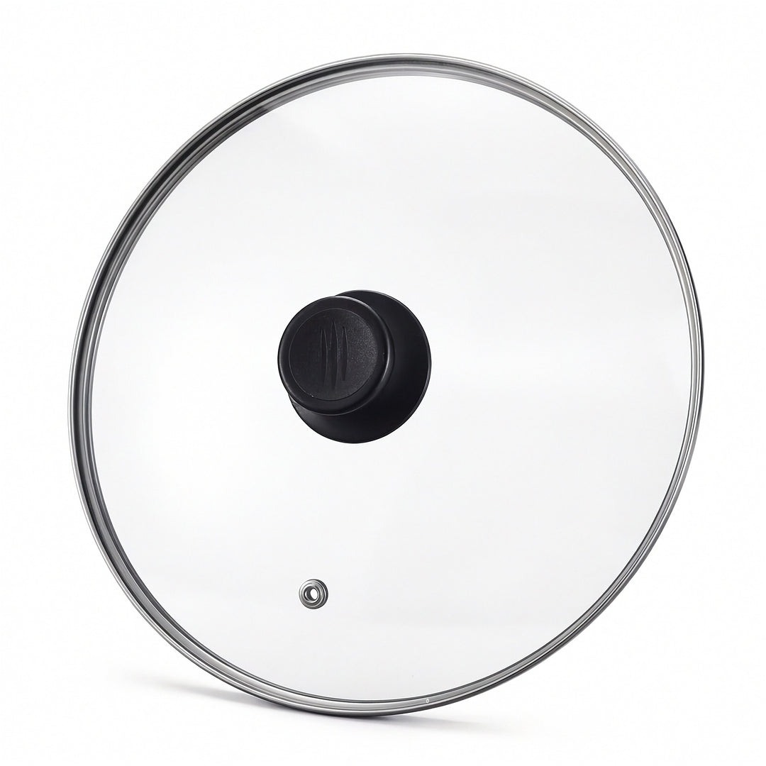 Clear glass cookware lid with a silver metal rim and a black plastic handle, shown on a white background.