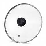 Clear glass cookware lid with a silver metal rim and a black plastic handle, shown on a white background.