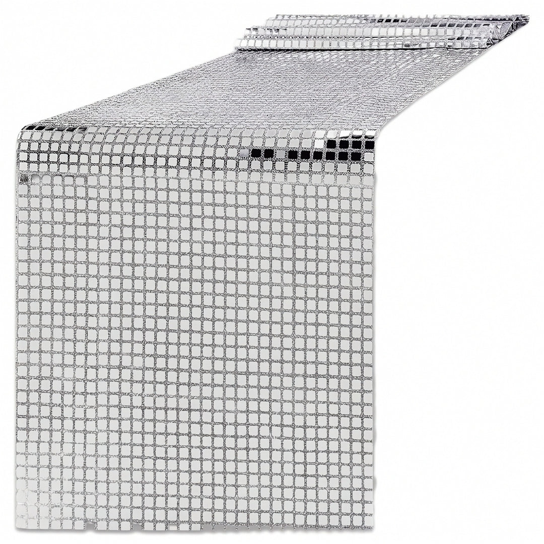 A silver disco ball mesh table runner with a reflective grid pattern, shown partially unrolled on a white background.