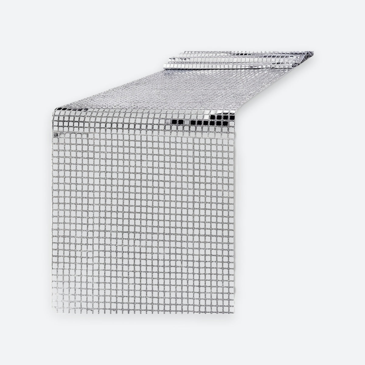 A silver disco ball mesh table runner with a reflective grid pattern, shown partially unrolled on a light gray background.