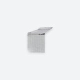 A silver metallic L-shaped corner shelf or bracket with a fine grid pattern, shown on a solid light gray background.