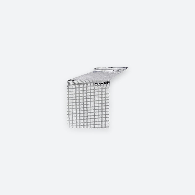 A silver metallic L-shaped corner shelf or bracket with a fine grid pattern, shown on a solid light gray background.