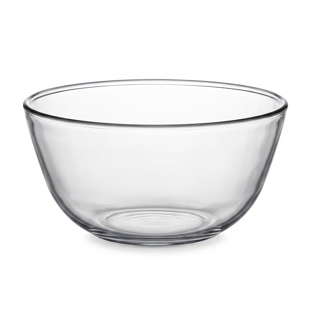 A clear glass mixing bowl with a wide rim and tapered sides, shown on a plain white background.