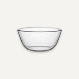 A clear glass bowl with a wide rim and gently curved sides, shown on a plain light gray background.