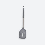 A gray silicone kitchen spatula with a stainless steel handle and a dark gray grip, shown against a light gray background.
