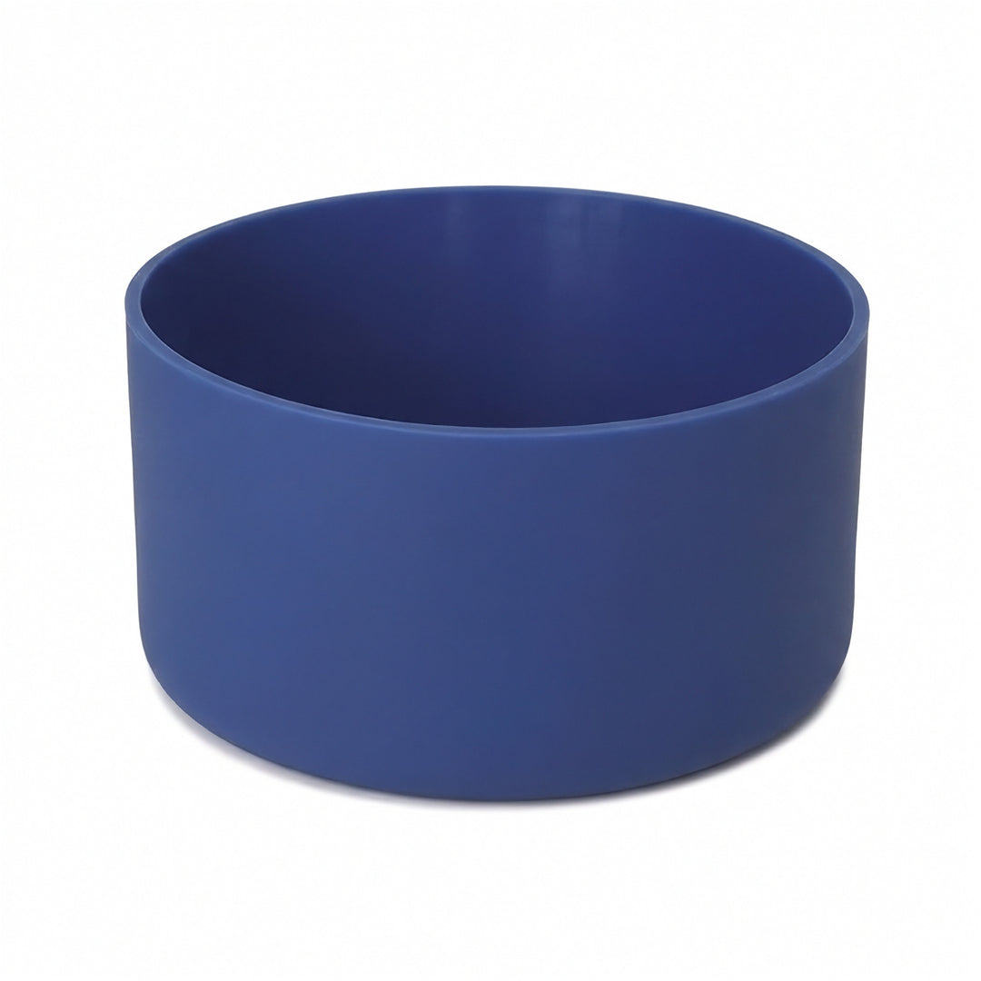 A solid blue cylindrical bowl or planter with a matte finish, shown on a clean white background.