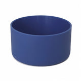 A solid blue cylindrical bowl or planter with a matte finish, shown on a clean white background.