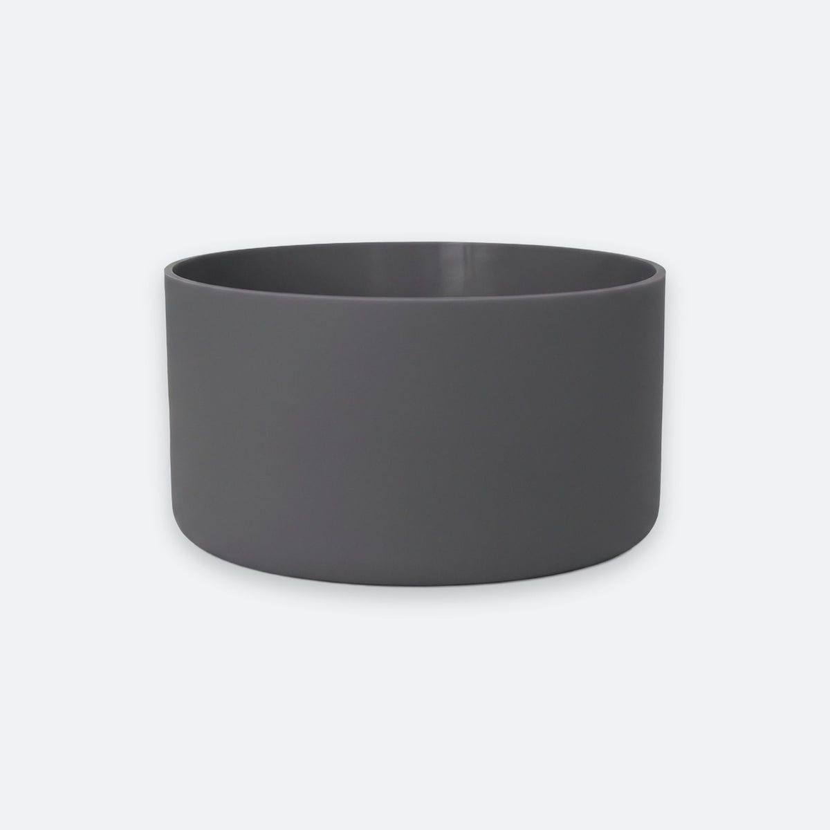 A dark gray cylindrical planter or bowl with a matte finish, shown against a light gray background.