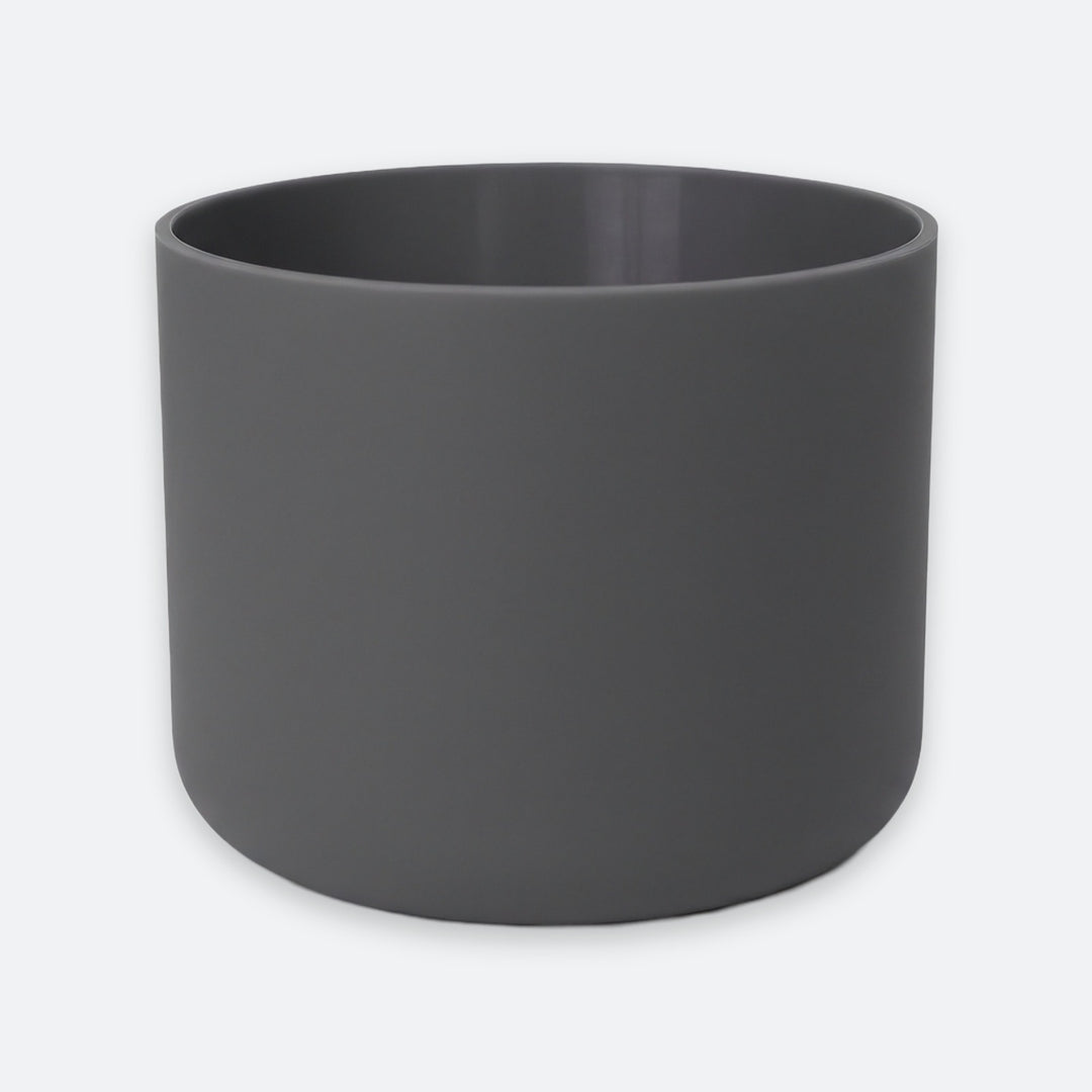 A matte dark gray cylindrical planter pot with a smooth, matte finish, shown against a light gray background.