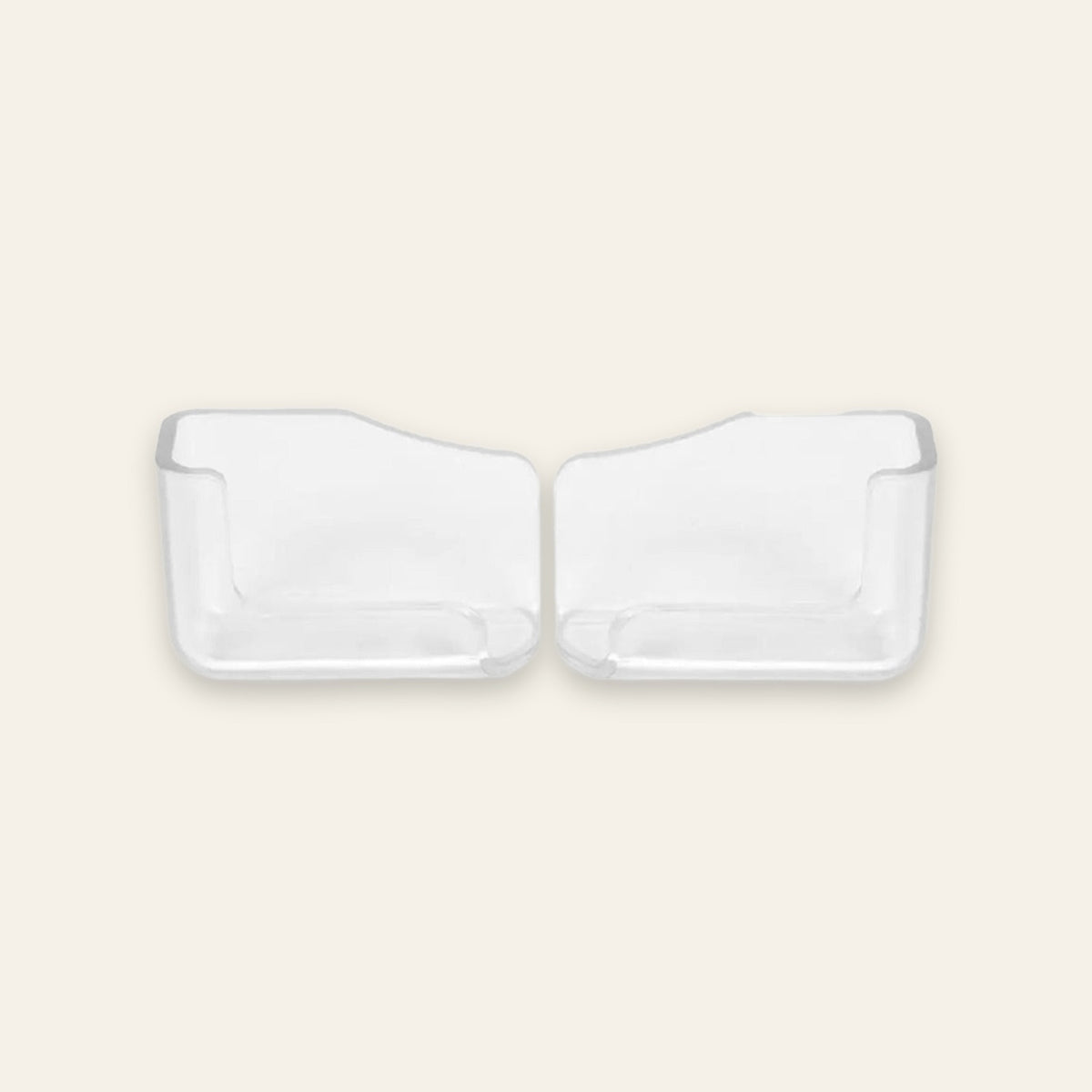 Two clear plastic refrigerator door pocket inserts shown side by side on a light beige background.