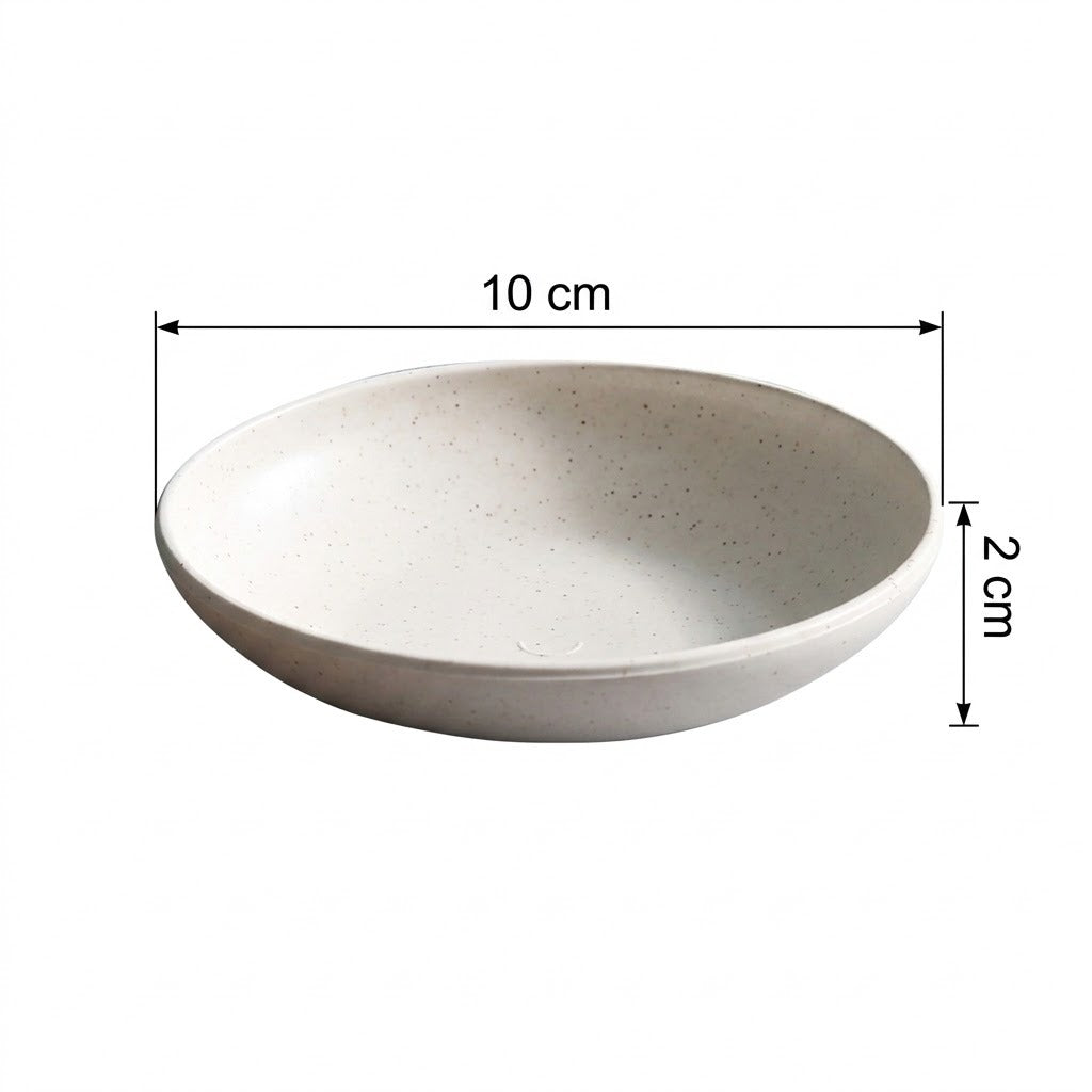 Speckled cream round shallow dish on a white background with labels showing 10 cm across and 2 cm high.