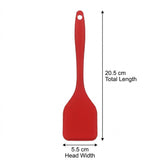 A red spatula on white has measurement arrows labelled 20.5 cm total length and 5.5 cm head width.