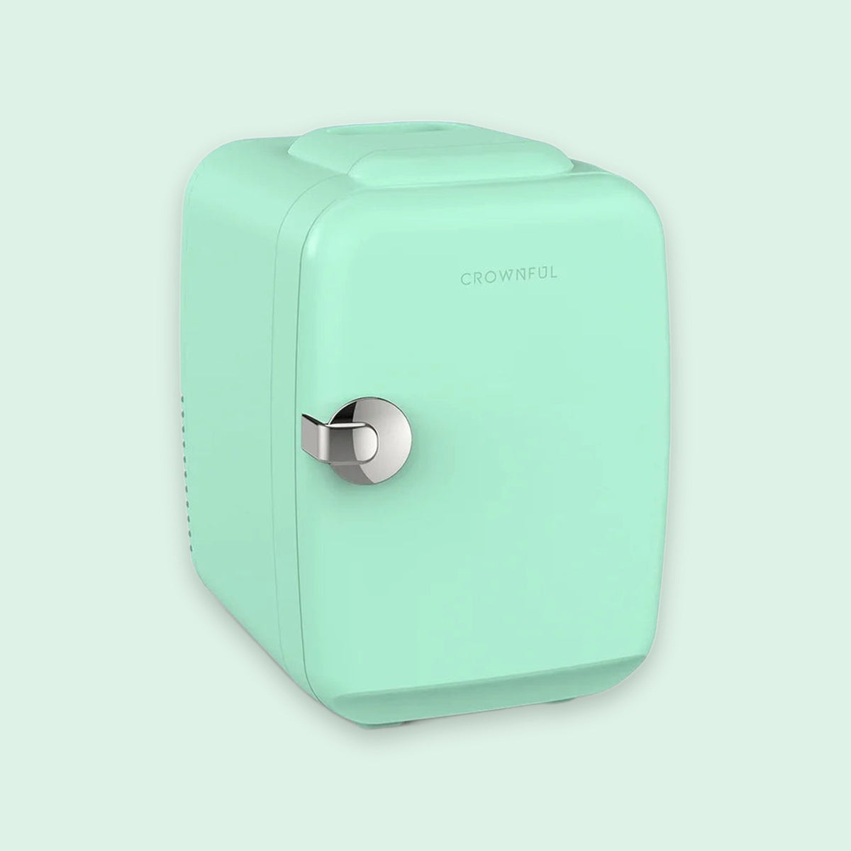A mint green portable mini refrigerator with a silver handle and the brand name 'CROWNFUL' printed on the front, set against a matching light mint green background.