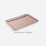 Rose-gold rectangular metal tray on a white background, labeled 16.9 × 11 inches (43 × 28 cm).