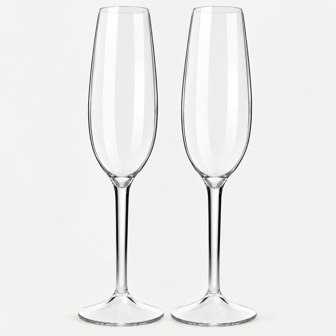Set of 2 rounded clear Tritan plastic champagne flutes on a light warm grey backdrop