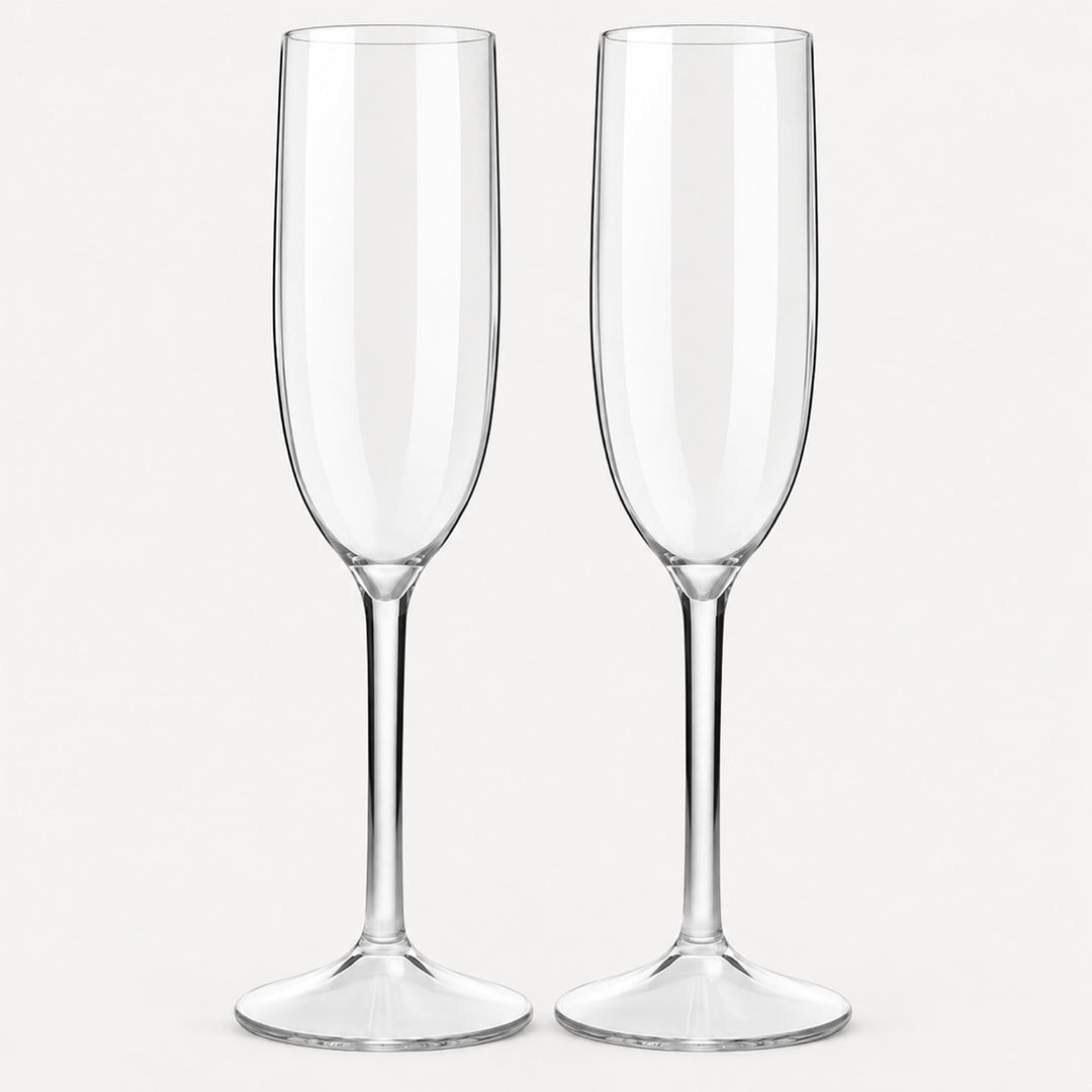 Set of 2 straight-sided clear Tritan plastic champagne flutes on a light warm grey backdrop