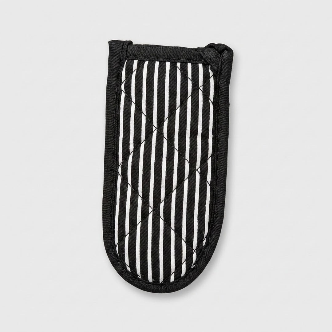 A quilted oven mitt with a black and white vertical stripe pattern, featuring a black stitched border and loop handles, shown on a light gray background.