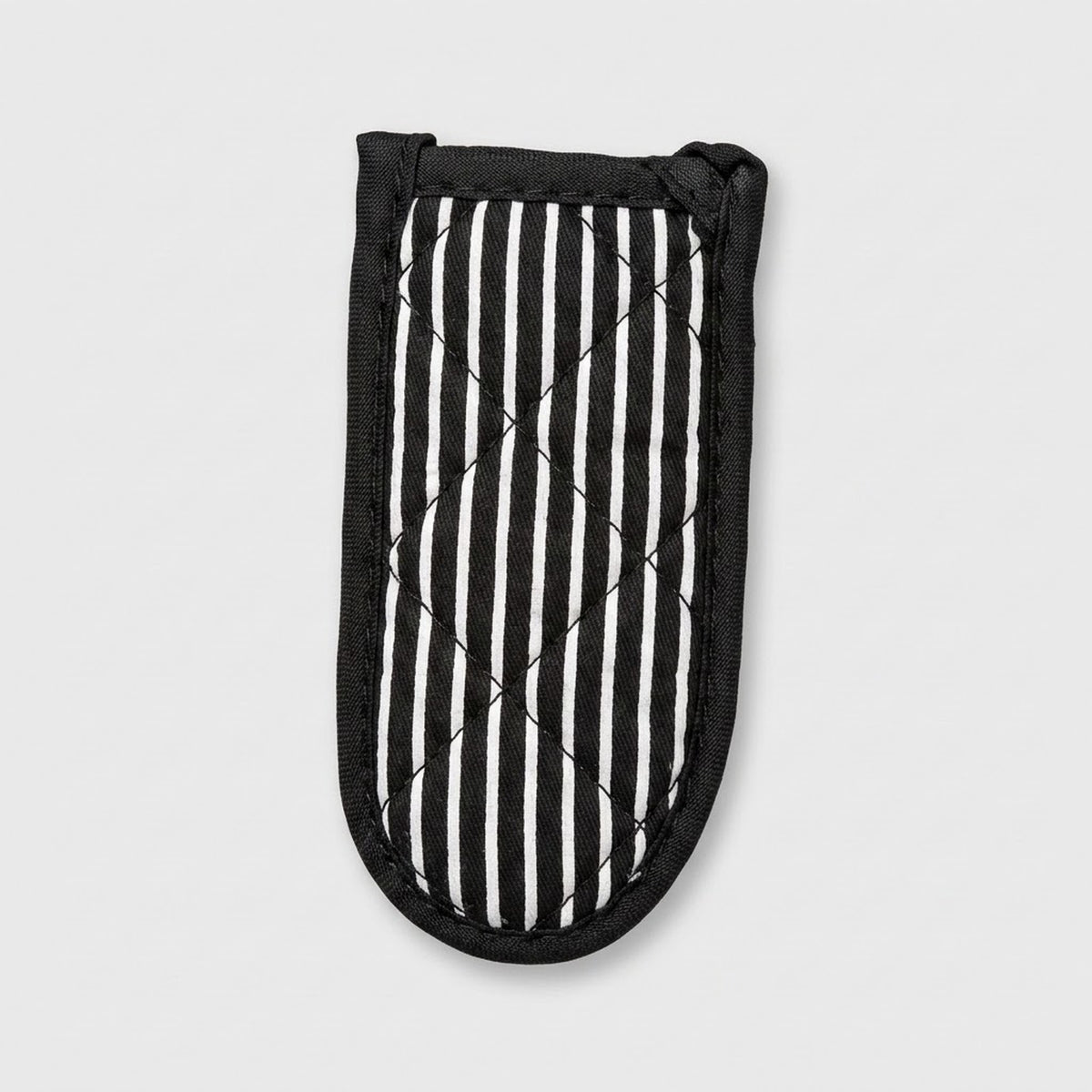 A quilted oven mitt with a black and white vertical stripe pattern, featuring a black stitched border and loop handles, shown on a light gray background.