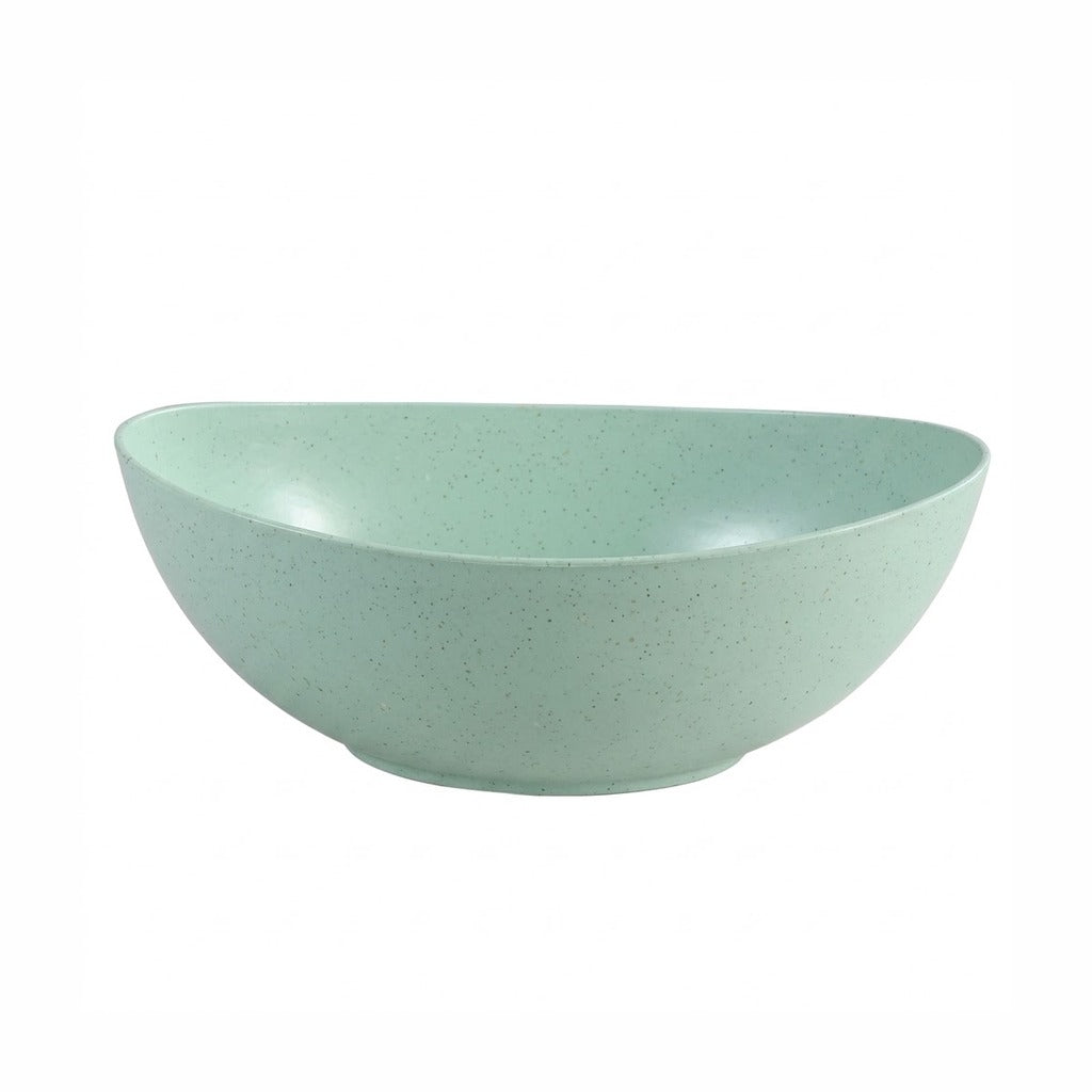 A light mint green ceramic bowl with a subtle speckled texture, shown from a side angle on a plain white background.