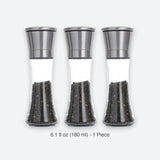 Three clear glass pepper mills with stainless steel tops, shown side by side on a light gray background with the text '6.1 fl oz (180 ml) - 1 Piece' below.