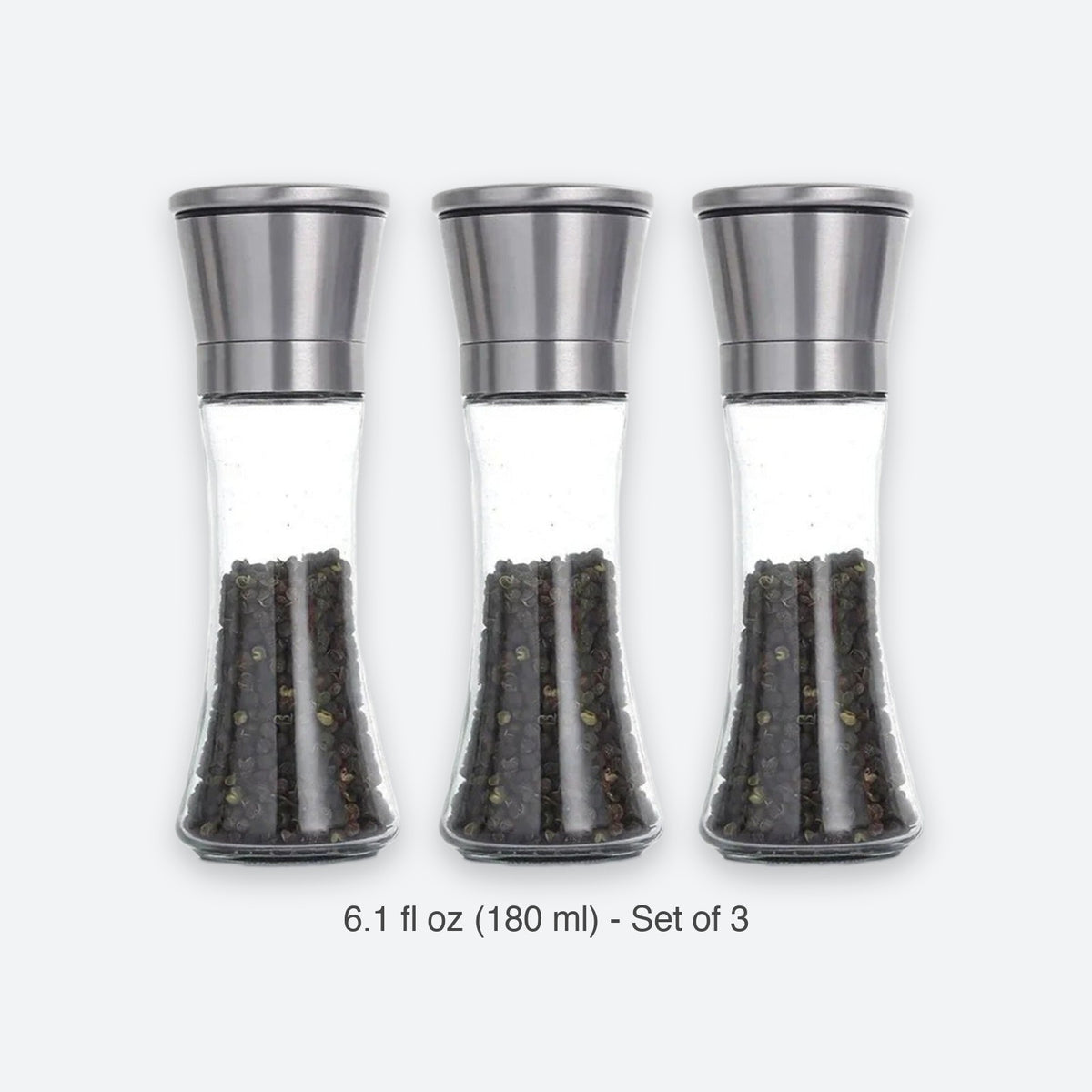 Three clear glass pepper mills with stainless steel tops, shown side by side on a light gray background with the text '6.1 fl oz (180 ml) - 1 Piece' below.