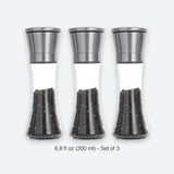 Three clear glass pepper mills with brushed silver metal tops, shown side by side on a light gray background with the text '6.8 fl oz (200 ml) - Set of 3' below.